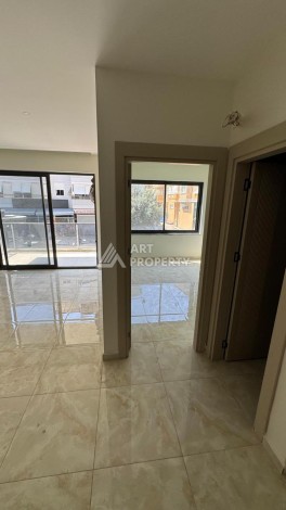 Современная квартира 1+1 в 600 м от пляжа Клеопатры. Новая резиденция в центре Алании - Ракурс 16