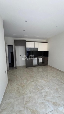 Современная квартира 1+1 в 600 м от пляжа Клеопатры. Новая резиденция в центре Алании - Ракурс 17