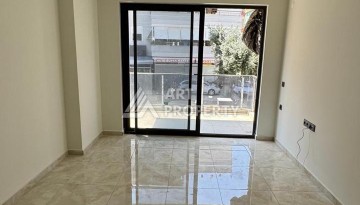 Современная квартира 1+1 в 600 м от пляжа Клеопатры. Новая резиденция в центре Алании - Ракурс 19