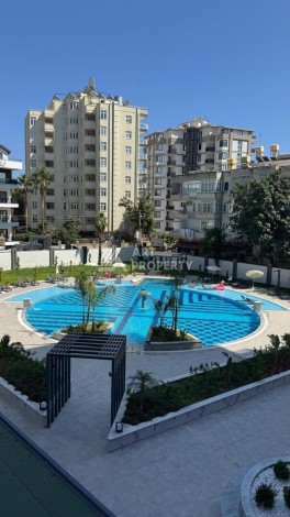 Современная квартира 1+1 в 600 м от пляжа Клеопатры. Новая резиденция в центре Алании - Ракурс 20