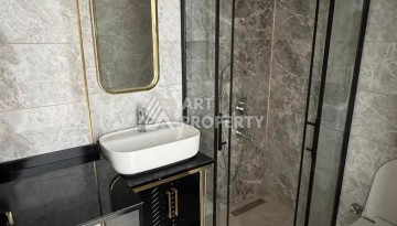 Современная квартира 1+1 в 600 м от пляжа Клеопатры. Новая резиденция в центре Алании - Ракурс 22