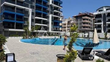 Современная квартира 1+1 в 600 м от пляжа Клеопатры. Новая резиденция в центре Алании - Ракурс 25