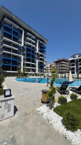 Современная квартира 1+1 в 600 м от пляжа Клеопатры. Новая резиденция в центре Алании - Ракурс 24