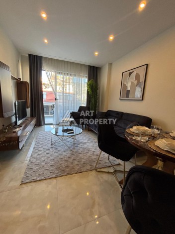 Меблированная квартира 1+1 в новой резиденции у пляжа Клеопатры, 55 кв.м. - Ракурс 2