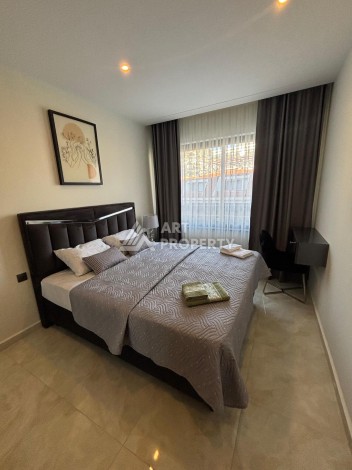 Меблированная квартира 1+1 в новой резиденции у пляжа Клеопатры, 55 кв.м. - Ракурс 7