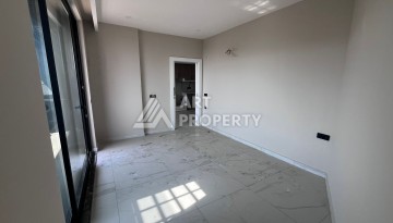 Квартира 1+1 в премиальном комплексе в центре Алании, всего в 400 метрах от пляжа Клеопатра - Ракурс 14