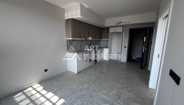 Квартира 1+1 в премиальном комплексе в центре Алании, всего в 400 метрах от пляжа Клеопатра - Ракурс 15