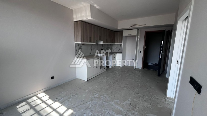 Квартира 1+1 в премиальном комплексе в центре Алании, всего в 400 метрах от пляжа Клеопатра - Ракурс 14