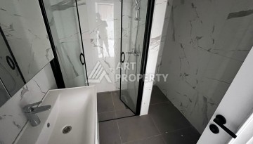 Квартира 1+1 в премиальном комплексе в центре Алании, всего в 400 метрах от пляжа Клеопатра - Ракурс 17