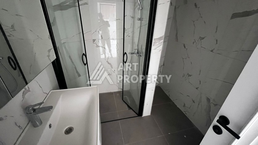 Квартира 1+1 в премиальном комплексе в центре Алании, всего в 400 метрах от пляжа Клеопатра - Ракурс 16