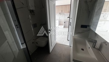 Квартира 1+1 в премиальном комплексе в центре Алании, всего в 400 метрах от пляжа Клеопатра - Ракурс 18