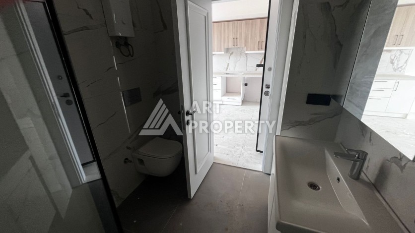 Квартира 1+1 в премиальном комплексе в центре Алании, всего в 400 метрах от пляжа Клеопатра - Ракурс 17