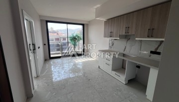 Квартира 1+1 в премиальном комплексе в центре Алании, всего в 400 метрах от пляжа Клеопатра - Ракурс 20