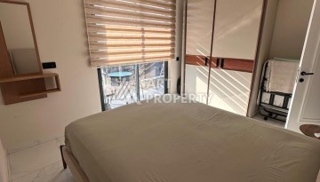 Меблированная квартира 1+1 в премиальном комплексе в центре Алании, в 400 метрах от пляжа Клеопатра - Ракурс 2