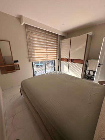 Меблированная квартира 1+1 в премиальном комплексе в центре Алании, в 400 метрах от пляжа Клеопатра - Ракурс 1