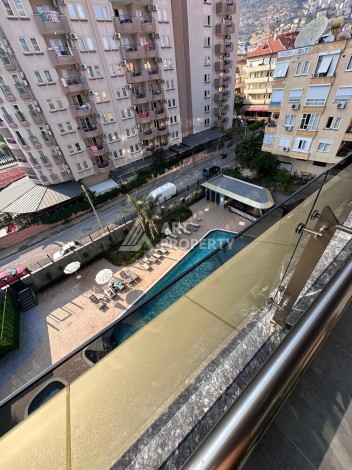 Меблированная квартира 1+1 в премиальном комплексе в центре Алании, в 400 метрах от пляжа Клеопатра - Ракурс 4