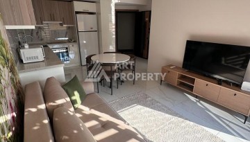 Меблированная квартира 1+1 в премиальном комплексе в центре Алании, в 400 метрах от пляжа Клеопатра - Ракурс 6