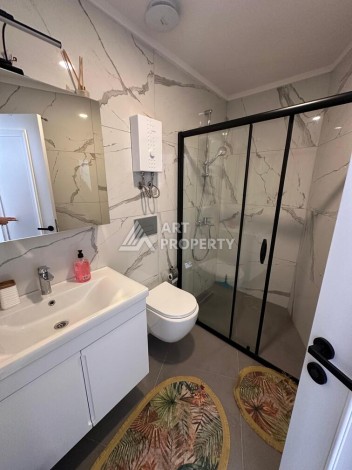 Меблированная квартира 1+1 в премиальном комплексе в центре Алании, в 400 метрах от пляжа Клеопатра - Ракурс 9