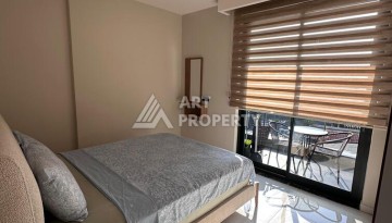 Меблированная квартира 1+1 в премиальном комплексе в центре Алании, в 400 метрах от пляжа Клеопатра - Ракурс 12