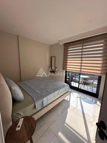 Меблированная квартира 1+1 в премиальном комплексе в центре Алании, в 400 метрах от пляжа Клеопатра - Ракурс 11