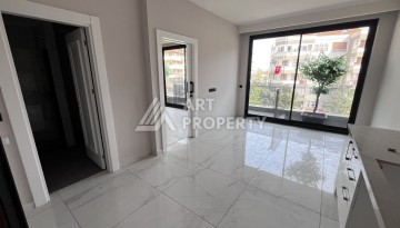 Квартира 1+1 без мебели в новом комплексе в центре Алании, всего 400 метров от пляжа Клеопатра - Ракурс 8