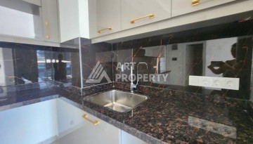 Квартира 1+1 с разрешением на сдачу в аренду в премиальном комплексе Махмутлара - Ракурс 12