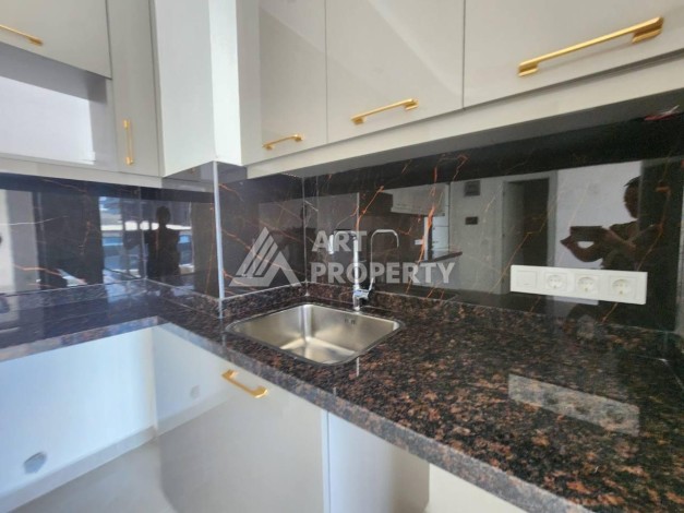 Квартира 1+1 с разрешением на сдачу в аренду в премиальном комплексе Махмутлара - Ракурс 11