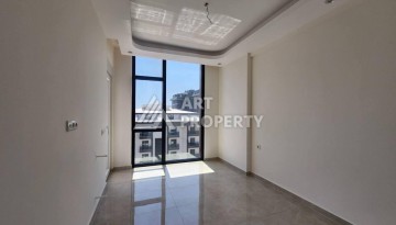 Квартира 1+1 с разрешением на сдачу в аренду в премиальном комплексе Махмутлара - Ракурс 13