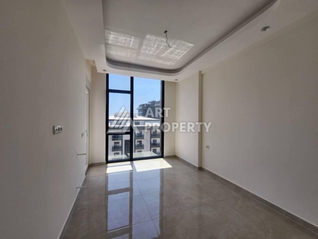 Квартира 1+1 с разрешением на сдачу в аренду в премиальном комплексе Махмутлара - Ракурс 12