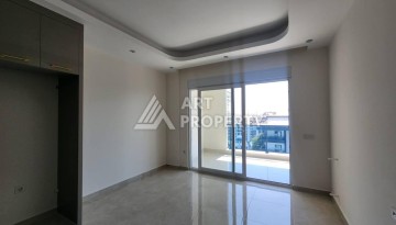 Квартира 1+1 с разрешением на сдачу в аренду в премиальном комплексе Махмутлара - Ракурс 16