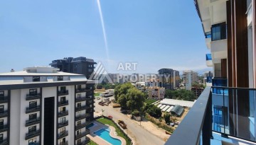 Квартира 1+1 с разрешением на сдачу в аренду в премиальном комплексе Махмутлара - Ракурс 20