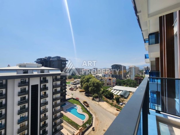 Квартира 1+1 с разрешением на сдачу в аренду в премиальном комплексе Махмутлара - Ракурс 19