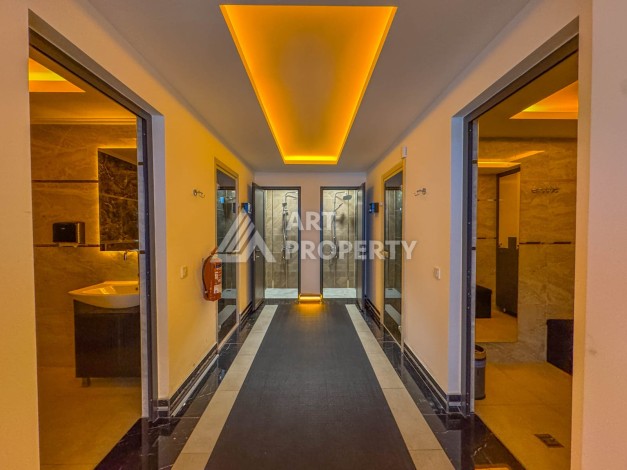 Квартира 1+1 с разрешением на сдачу в аренду в премиальном комплексе Махмутлара - Ракурс 2