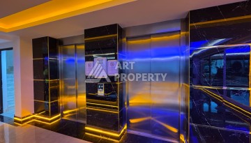 Квартира 1+1 с разрешением на сдачу в аренду в премиальном комплексе Махмутлара - Ракурс 4