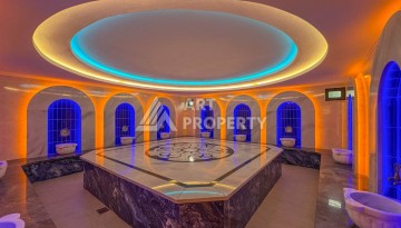 Квартира 1+1 с разрешением на сдачу в аренду в премиальном комплексе Махмутлара - Ракурс 7