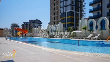 Квартира 1+1 с разрешением на сдачу в аренду в премиальном комплексе Махмутлара - Ракурс 22