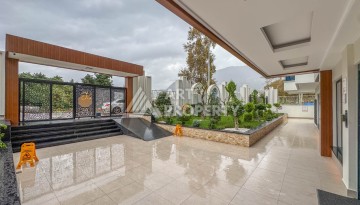 Квартира 1+1 с разрешением на сдачу в аренду в премиальном комплексе Махмутлара - Ракурс 26