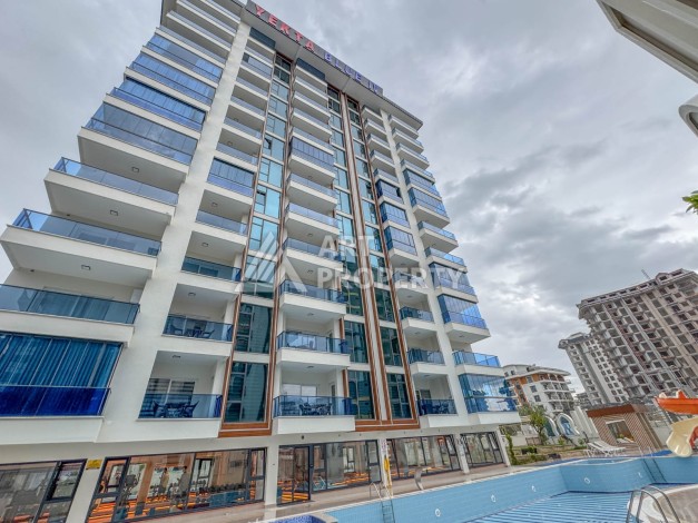 Квартира 1+1 с разрешением на сдачу в аренду в премиальном комплексе Махмутлара - Ракурс 27