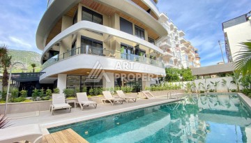 Квартира 1+1 с стильной резиденции у пляжа Клеопатры, 55 кв.м. - Ракурс 1