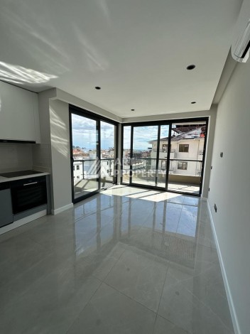 Квартира 1+1 с стильной резиденции у пляжа Клеопатры, 55 кв.м. - Ракурс 2