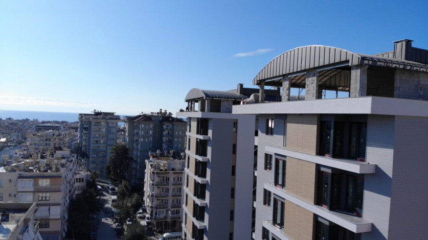 Четырехкомнатная квартира в центре Алании в новом современном комплексе, 120 м2 - Ракурс 10