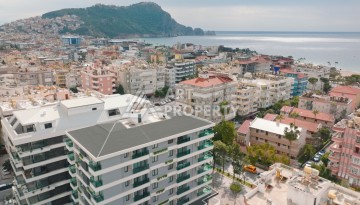 Квартира 1+1 в 200 м от пляжа Клеопатры. Новый дом в центре Алании - Ракурс 1