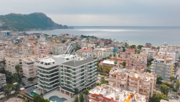 Квартира 1+1 в 200 м от пляжа Клеопатры. Новый дом в центре Алании - Ракурс 2