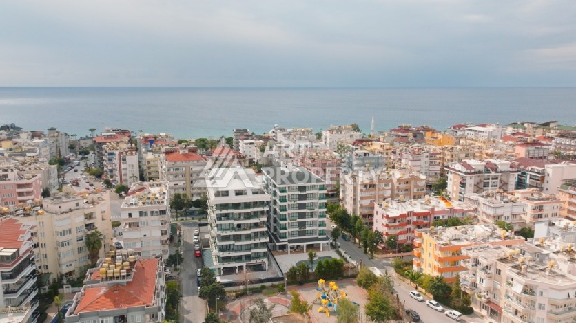 Квартира 1+1 в 200 м от пляжа Клеопатры. Новый дом в центре Алании - Ракурс 2