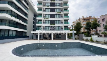 Квартира 1+1 в 200 м от пляжа Клеопатры. Новый дом в центре Алании - Ракурс 4