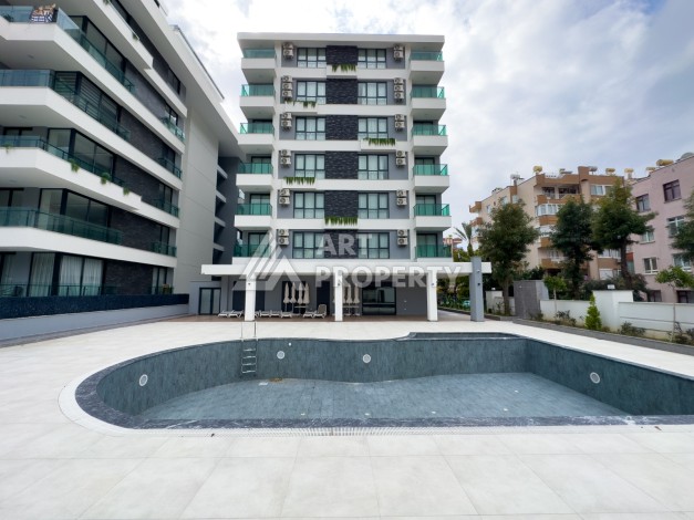 Квартира 1+1 в 200 м от пляжа Клеопатры. Новый дом в центре Алании - Ракурс 3