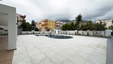 Квартира 1+1 в 200 м от пляжа Клеопатры. Новый дом в центре Алании - Ракурс 6