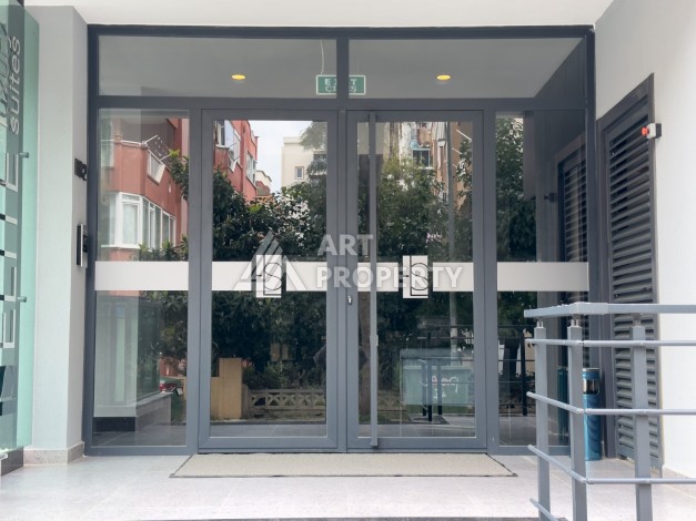 Квартира 1+1 в 200 м от пляжа Клеопатры. Новый дом в центре Алании - Ракурс 6