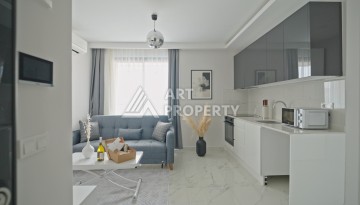 Квартира 1+1 в 200 м от пляжа Клеопатры. Новый дом в центре Алании - Ракурс 16