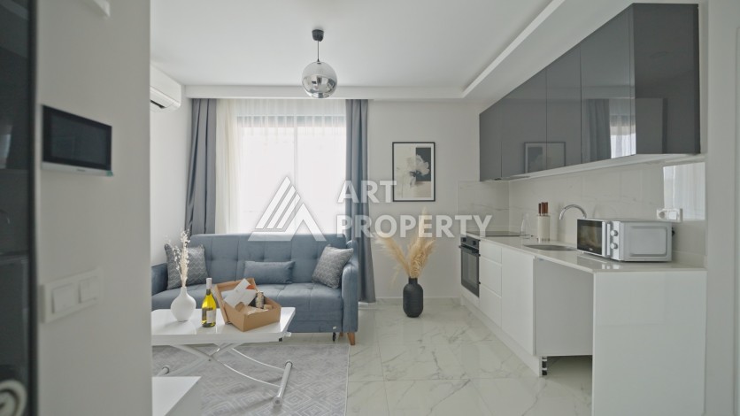 Квартира 1+1 в 200 м от пляжа Клеопатры. Новый дом в центре Алании - Ракурс 15